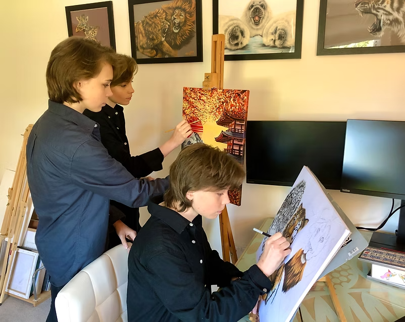 Girls painting together